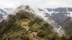 Terraced Inca ruins of Choquequirao on a misty cloud-forest ridge in Peru
