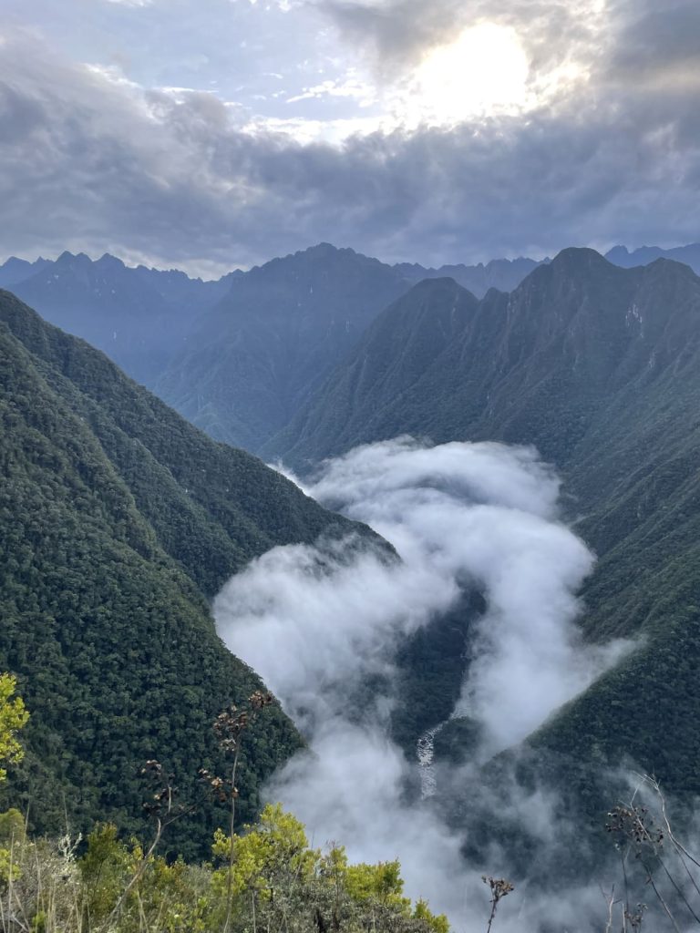A river of cloud filling the Urubamba valley at dawn, seen from the Inca Trail