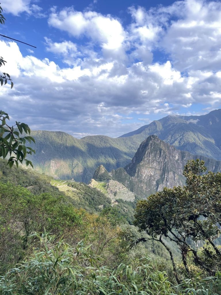 Huayna Picchu rising behind Machu Picchu, seen from the Inca Trail below the Sun Gate